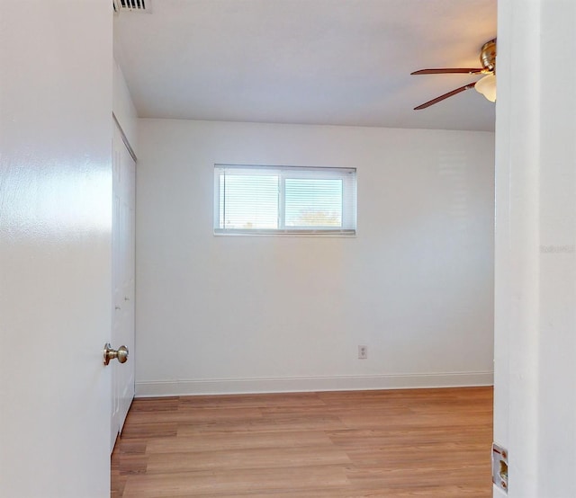 unfurnished room featuring ceiling fan and light hardwood / wood-style flooring