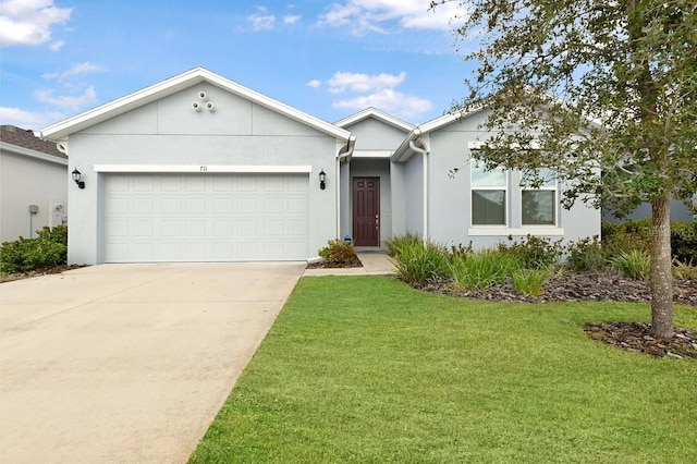 ranch-style house featuring a front yard, concrete driveway, an attached garage, and stucco siding