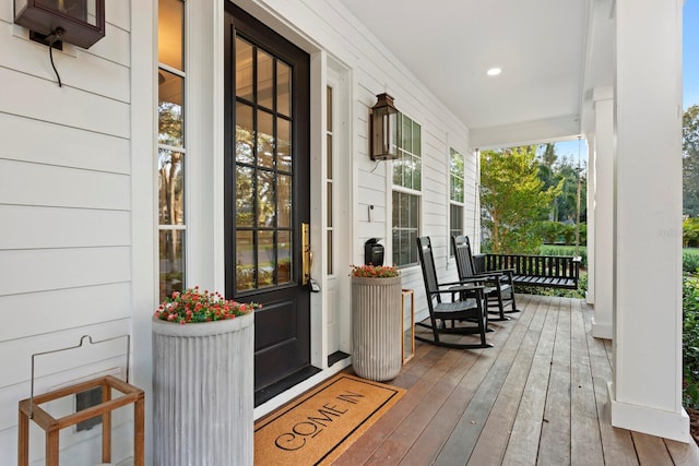 wooden terrace featuring a porch