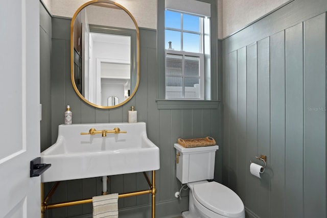 bathroom with sink and toilet