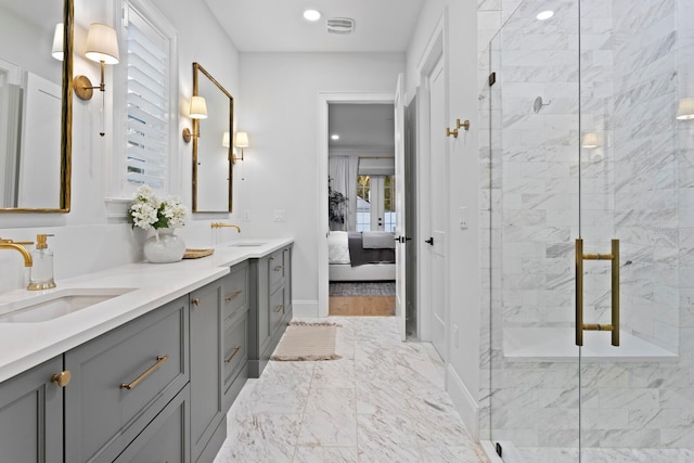 bathroom with vanity and walk in shower