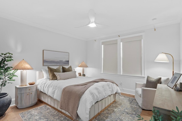 bedroom with hardwood / wood-style flooring and ceiling fan