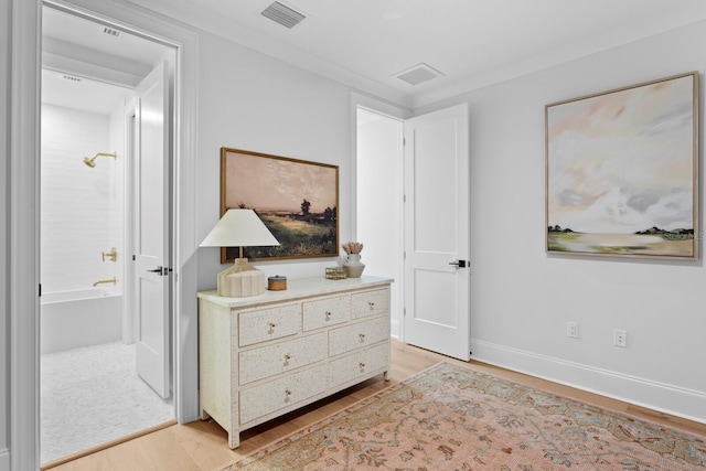 bedroom with light hardwood / wood-style floors