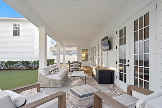 view of patio / terrace featuring an outdoor hangout area and french doors