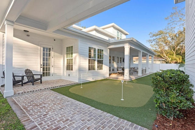 rear view of house featuring a patio area