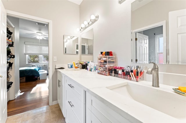 bathroom featuring vanity, tile patterned floors, and ceiling fan