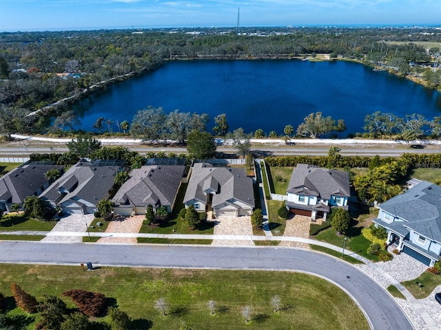 drone / aerial view with a water view