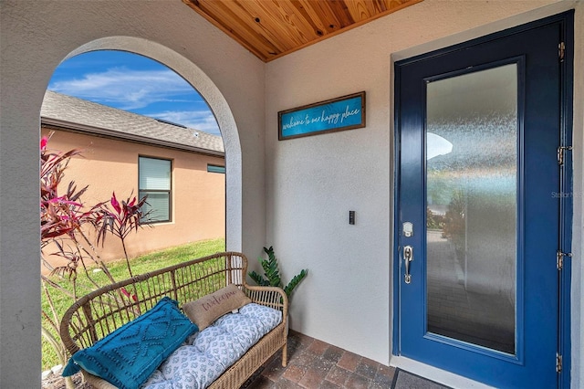 entrance to property with a balcony