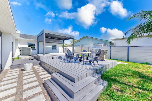 wooden terrace featuring fence and central AC unit