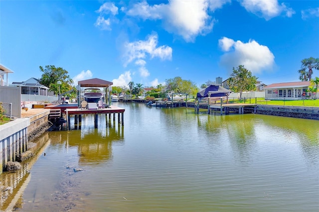 view of dock with a water view and boat lift