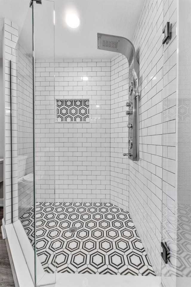 bathroom featuring walk in shower