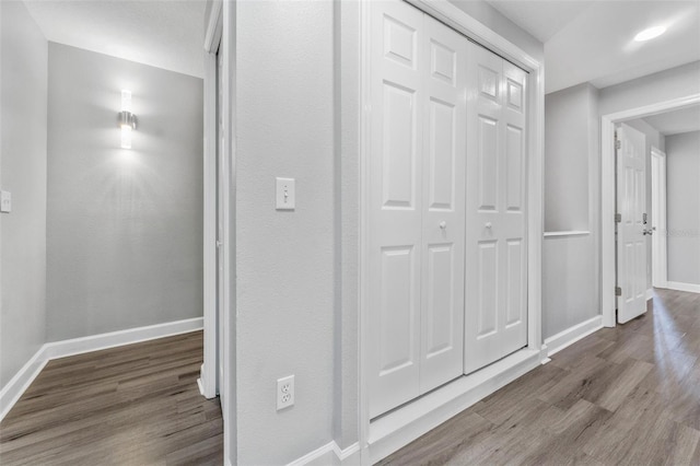 corridor featuring hardwood / wood-style flooring