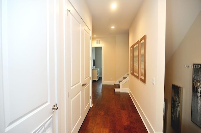 corridor with dark wood-type flooring