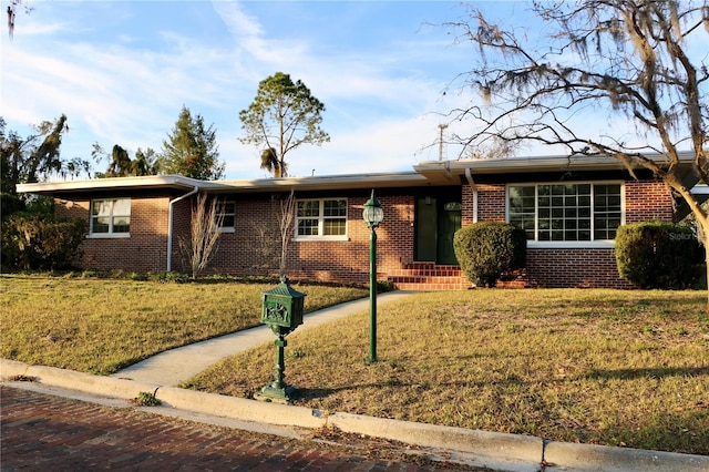 ranch-style house with a front yard