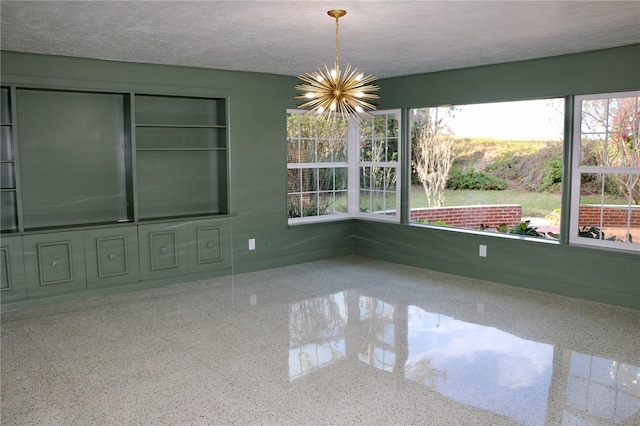 interior space featuring an inviting chandelier