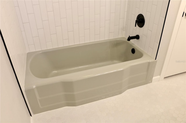 bathroom featuring a tub to relax in