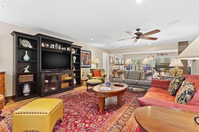 living room featuring ceiling fan