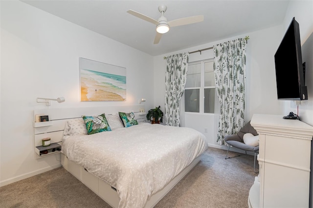 bedroom with light carpet and ceiling fan