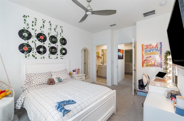 bedroom with ceiling fan and light colored carpet