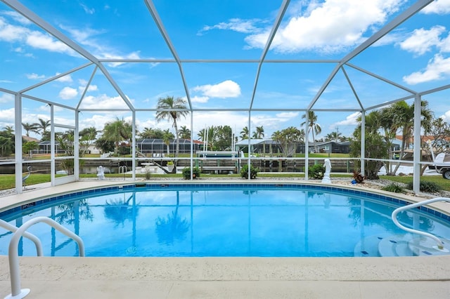 view of pool featuring a lanai