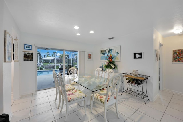 dining area with light tile patterned flooring