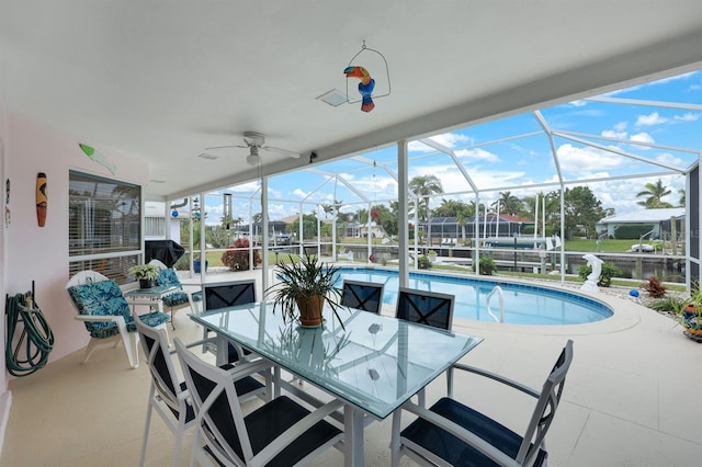 exterior space featuring ceiling fan