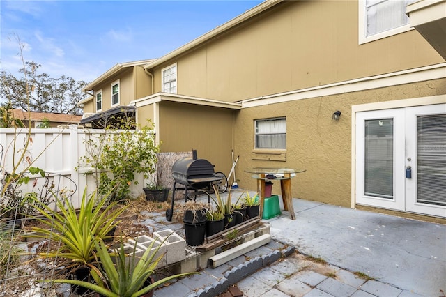 view of patio featuring french doors