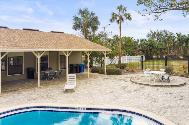 view of pool featuring a patio