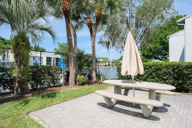 view of patio / terrace with a water view