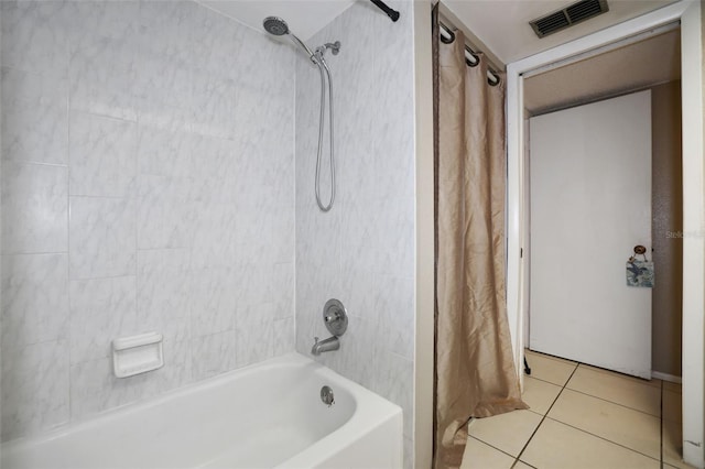 bathroom featuring shower / bath combo and tile patterned floors