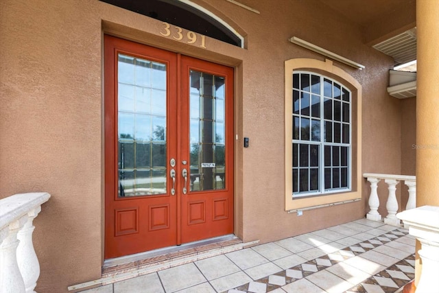 property entrance with french doors