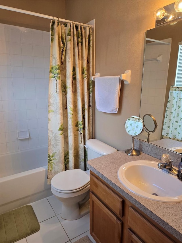 full bathroom with vanity, toilet, tile patterned floors, and shower / tub combo with curtain