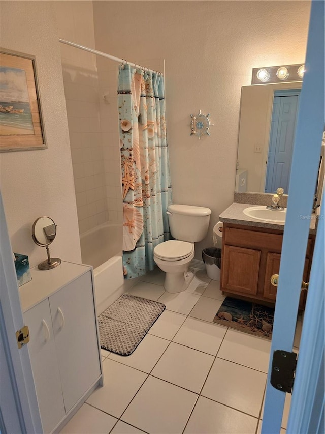 full bathroom with shower / bathtub combination with curtain, vanity, tile patterned floors, and toilet