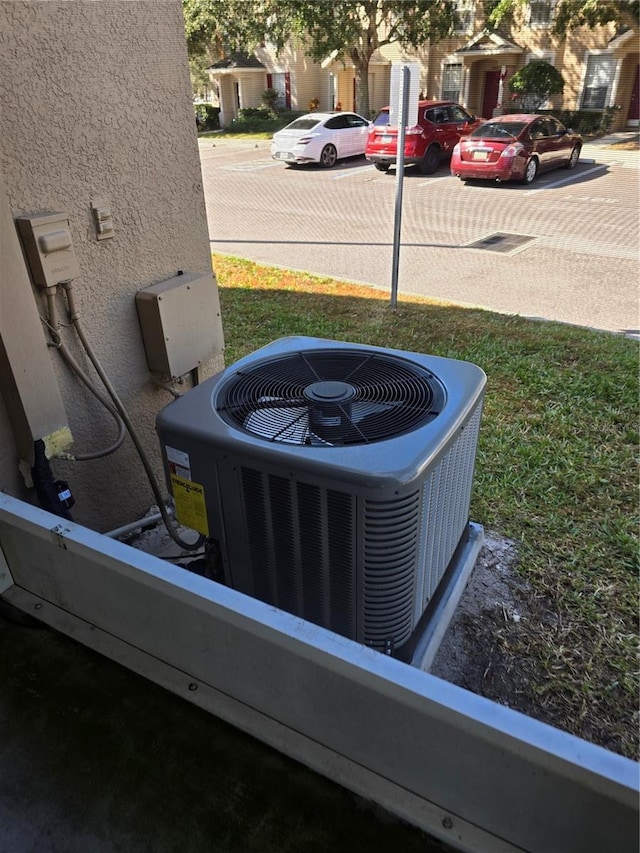 exterior details featuring cooling unit