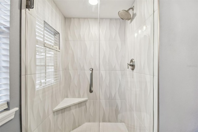 bathroom featuring walk in shower