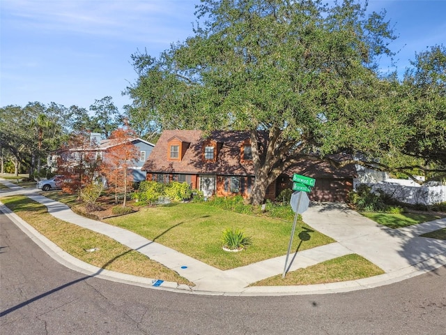 view of front of property with a front lawn