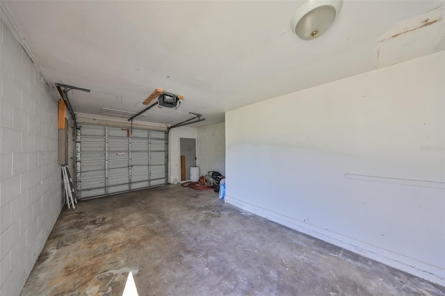 garage featuring a garage door opener