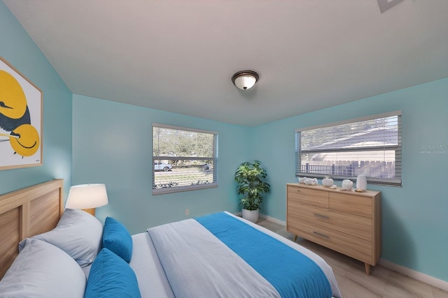 6025 Florida Cir S, Apollo Beach, FL 33572 - bedroom with baseboards and light wood finished floors