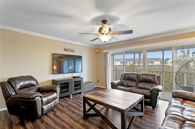 living room featuring dark hardwood / wood-style flooring, crown molding, and ceiling fan