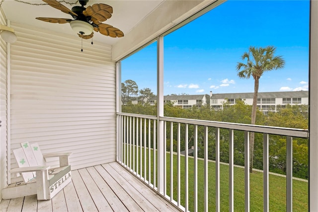 exterior space with ceiling fan