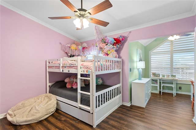 bedroom featuring ceiling fan, ornamental molding, and dark hardwood / wood-style flooring