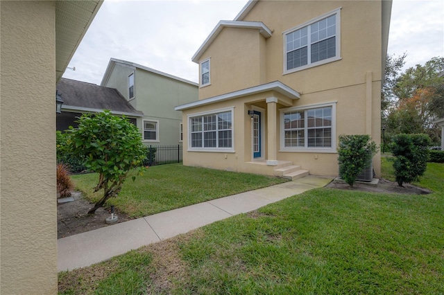 view of front of home with a front yard