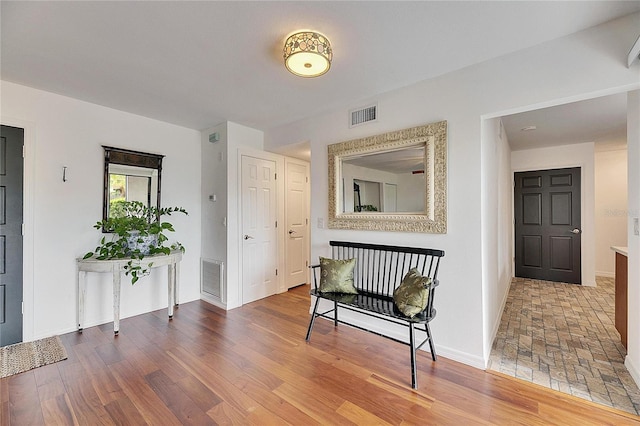 living area featuring hardwood / wood-style flooring