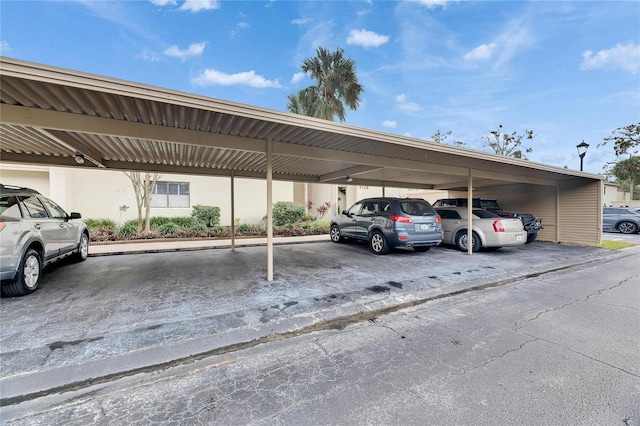 view of car parking featuring a carport