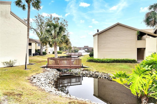 view of yard with a wooden deck