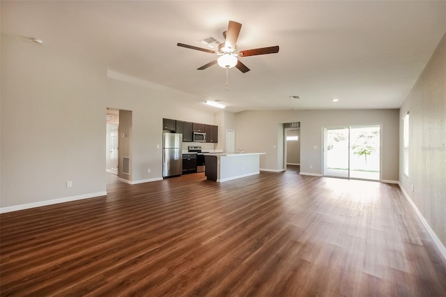 unfurnished living room with dark wood-type flooring and ceiling fan