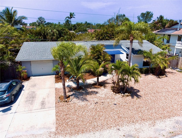 single story home with a garage