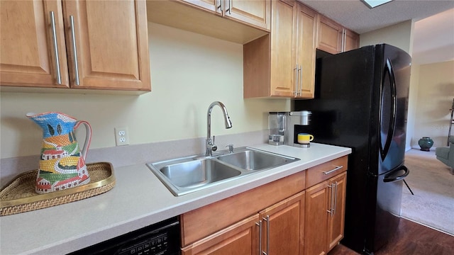 kitchen with sink and black appliances