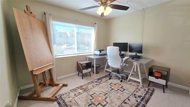 office featuring ceiling fan and carpet