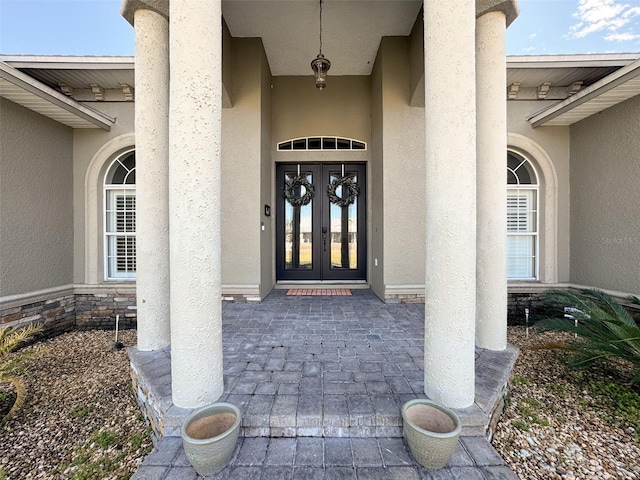 property entrance featuring french doors